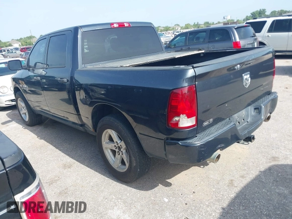 2014 Ram 1500 Express with VIN 3C6RR6KT6EG197063, listed as a IAAI auction lot 42521461 with 254,231 mi miles and . Bid and sale history available at DreamBid. Image 3.