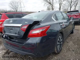 2018 Nissan Altima 2.5 SL with VIN 1N4AL3AP7JC165994, listed as a IAAI auction lot 41678939 with 126,336 mi miles. Bid and sale history available at carsss.com. Image 4.