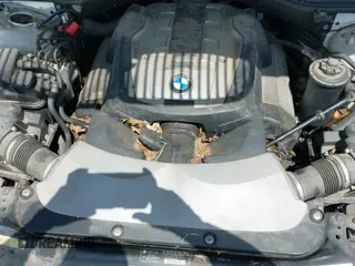 2006 BMW 7 Series 750i with VIN WBAHL83576DT03355, listed as a IAAI auction lot 42606906 with 186,494 mi miles and . Bid and sale history available at DreamBid. Image 12.