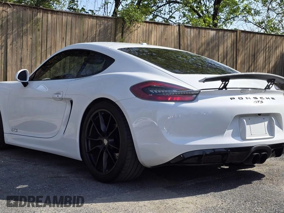 2016 Porsche Cayman S with VIN WP0AB2A88GK185895, listed as a Copart auction lot 54412305 with 27,100 mi miles and Salvage Title. Bid and sale history available at DreamBid. Image 3.