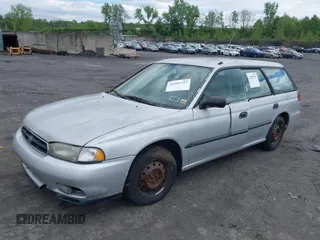 1998 Subaru Legacy L z VIN 4S3BK4353W7300794, wystawiony jako IAAI lot #42205793 z przebiegiem 227 539 mil mil oraz . Historia ofert i sprzedaży dostępna na DreamBid. Obrazek 2.