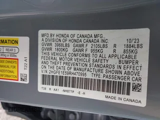 2024 Honda Civic Si z VIN 2HGFE1E59RH470995, wystawiony jako IAAI lot #41624743 z przebiegiem 14 524 mil mil oraz . Historia ofert i sprzedaży dostępna na DreamBid. Obrazek 9.