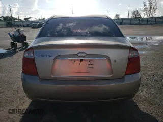 2006 Kia Spectra EX with VIN KNAFE121765256944, listed as a Copart auction lot 68667844 with 98,316 mi miles and Salvage Title. Bid and sale history available at carsss.com. Image 6.