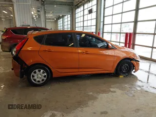 2015 Hyundai Accent GS with VIN KMHCT5AE6FU211955, listed as a IAAI auction lot 41610857 with 106,497 mi miles. Bid and sale history available at carsss.com. Image 13.