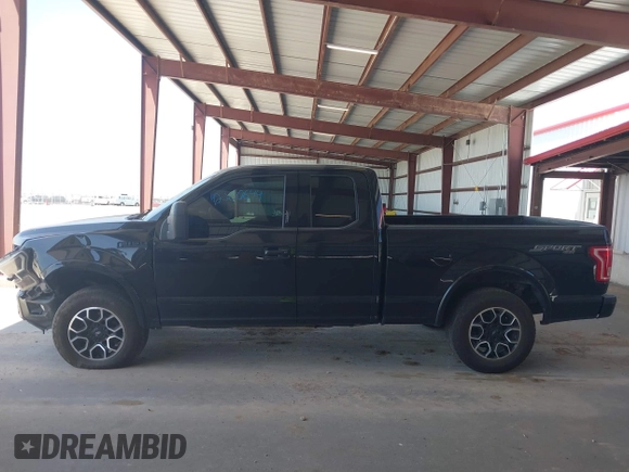 2015 Ford F-150 XLT z VIN 1FTFX1EFXFKE32133, wystawiony jako IAAI lot #42260644 z przebiegiem 136 724 mil mil oraz . Historia ofert i sprzedaży dostępna na DreamBid. Obrazek 14.