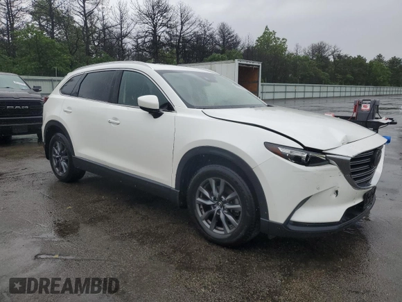 2021 Mazda CX-9 Touring z VIN JM3TCBCY1M0536616, wystawiony jako Copart lot #60242445 z przebiegiem 40 057 mil mil oraz Szkoda całkowita • Salvage title. Historia ofert i sprzedaży dostępna na DreamBid. Obrazek 4.