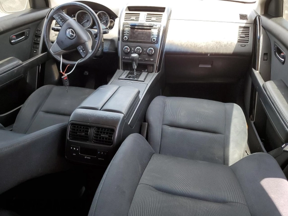2015 Mazda CX-9 Sport z VIN JM3TB2BAXF0447315, wystawiony jako Copart lot #60842505 z przebiegiem 122 281 mil mil oraz Szkoda całkowita • Salvage title. Historia ofert i sprzedaży dostępna na DreamBid. Obrazek 8.