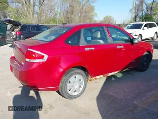 2010 Ford Focus S with VIN 1FAHP3ENXAW238107, listed as a IAAI auction lot 41974240 with 123,777 mi miles and . Bid and sale history available at carsss.com. Image 4.