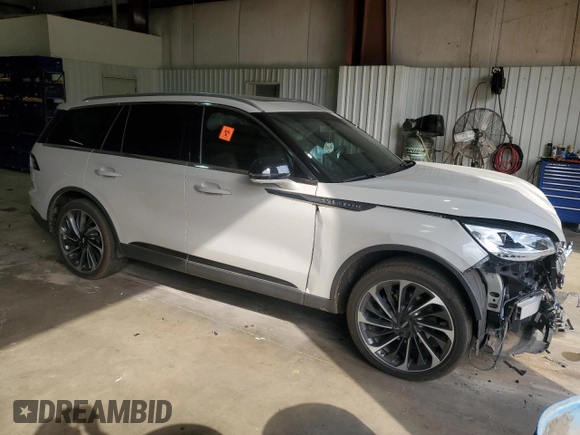 2021 Lincoln Aviator Reserve with VIN 5LM5J7XC9MGL13856, listed as a Copart auction lot 53813935 with 56,816 mi miles and Salvage title. Bid and sale history available at DreamBid. Image 4.