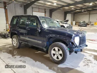 2012 Jeep Liberty Sport with VIN 1C4PJMAK1CW129000, listed as a Copart auction lot 49472635 with 77,124 mi miles and Salvage Title. Bid and sale history available at DreamBid. Image 4.