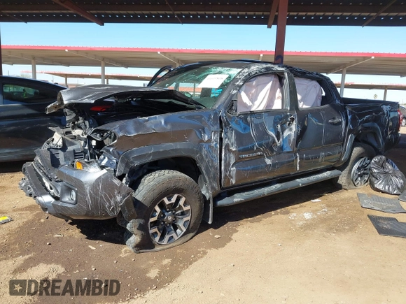 2017 Toyota Tacoma SR5 with VIN 3TMCZ5AN7HM104214, listed as a IAAI auction lot 41619808 with 48,236 mi miles and . Bid and sale history available at carsss.com. Image 16.