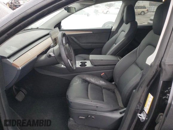 2024 Tesla Model Y with VIN 7SAYGDED1RF098054, listed as a Copart auction lot 44072195 with 16,085 mi miles and Salvage Title. Bid and sale history available at DreamBid. Image 7.