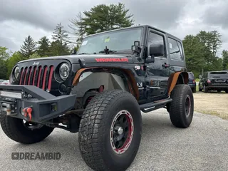 2008 Jeep Wrangler X with VIN 1J4FA24168L582227, listed as a Copart auction lot 58219065 with 98,284 mi miles and Salvage title. Bid and sale history available at DreamBid. Image 2.