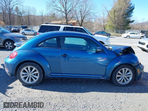 2017 Volkswagen Beetle 1.8T Fleet with VIN 3VWF17ATXHM630753, listed as a IAAI auction lot 41516106 with 62,841 mi miles. Bid and sale history available at carsss.com. Image 14.