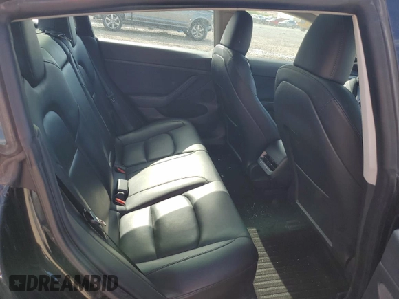 2023 Tesla Model 3 with VIN 5YJ3E1EAXPF708001, listed as a Copart auction lot 57252735 with 71,579 mi miles and Salvage title. Bid and sale history available at DreamBid. Image 10.
