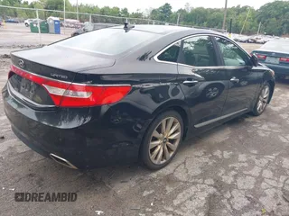 2015 Hyundai Azera Limited with VIN KMHFH4JG3FA446809, listed as a IAAI auction lot 42628069 with 136,777 mi miles and . Bid and sale history available at DreamBid. Image 4.