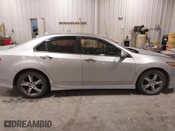 2012 Acura TSX Special Edition z VIN JH4CU2E88CC025368, wystawiony jako IAAI lot #41524028 z przebiegiem 135 434 mil mil oraz . Historia ofert i sprzedaży dostępna na DreamBid. Obrazek 13.