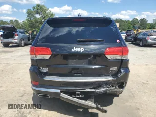 2015 Jeep Grand Cherokee Summit with VIN 1C4RJFJG6FC828922, listed as a Copart auction lot 54878415 with 125,781 mi miles and Salvage title. Bid and sale history available at DreamBid. Image 6.