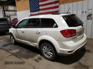 2017 Dodge Journey SXT с VIN 3C4PDDBG7HT592872, выставлен на аукционе Copart как лот 51666905 с пробегом 87 907 миль миль и Списание • Salvage title. История ставок и продаж доступна на DreamBid. Изображение 2.