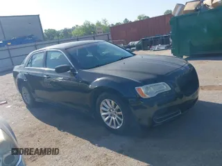 2013 Chrysler 300 with VIN 2C3CCAAGXDH743261, listed as a IAAI auction lot 41982698 with 148,107 mi miles. Bid and sale history available at carsss.com. Image 1.