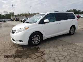 2012 Toyota Sienna XLE AAS with VIN 5TDYK3DC0CS250830, listed as a Copart auction lot 73323284 with 147,580 mi miles and Salvage Title. Bid and sale history available at DreamBid. Image 1.