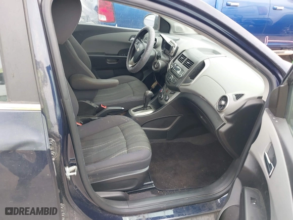 2015 Chevrolet Sonic LT with VIN 1G1JC5SH9F4127898, listed as a IAAI auction lot 41976381 with 148,658 mi miles. Bid and sale history available at carsss.com. Image 5.