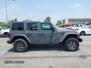 2020 Jeep Wrangler Unlimited Rubicon with VIN 1C4HJXFG3LW279636, listed as a IAAI auction lot 42430354 with 19,631 mi miles and . Bid and sale history available at DreamBid. Image 14.