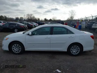 2014 Toyota Camry L with VIN 4T4BF1FKXER374901, listed as a IAAI auction lot 41861839 with 130,990 mi miles and . Bid and sale history available at DreamBid. Image 14.