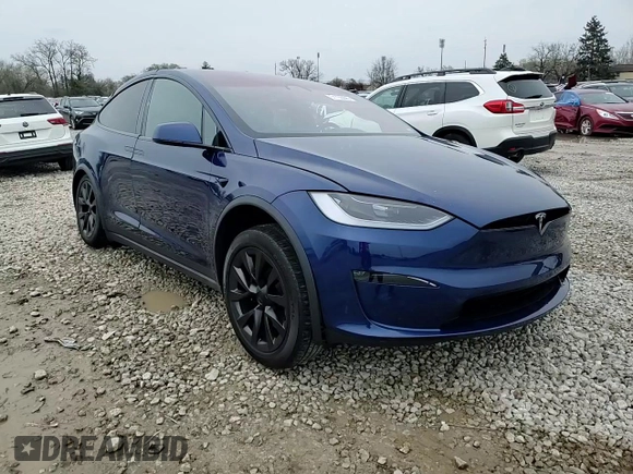 2023 Tesla Model X with VIN 7SAXCDE51PF415778, listed as a Copart auction lot 51792205 with Not Provided miles and Salvage Title. Bid and sale history available at DreamBid. Image 12.
