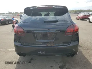 2013 Porsche Cayenne GTS с VIN WP1AD2A29DLA72323, выставлен на аукционе Copart как лот 52990885 с пробегом 100 812 миль миль и Списание • Salvage title. История ставок и продаж доступна на DreamBid. Изображение 6.