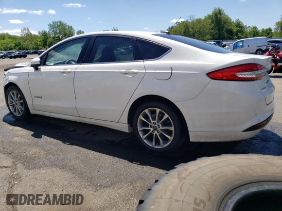 2017 Ford Fusion Hybrid SE with VIN 3FA6P0LU2HR326162, listed as a Copart auction lot 57495005 with 135,797 mi miles and Clean title. Bid and sale history available at DreamBid. Image 2.