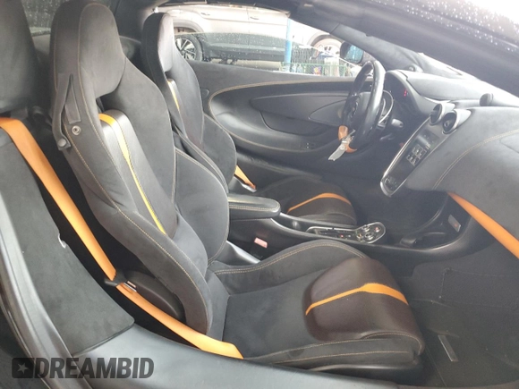 2018 McLaren 570S z VIN SBM13FAA1JW004280, wystawiony jako Copart lot #63609654 z przebiegiem 22 596 mil mil oraz Szkody całkowita. Historia ofert i sprzedaży dostępna na DreamBid. Obrazek 10.