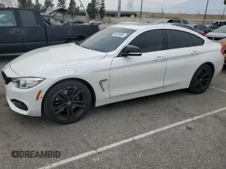 2015 BMW 4 Series 428i xDrive with VIN WBA4C9C59FD331372, listed as a Copart auction lot 58628665 with 81,245 mi miles and Salvage title. Bid and sale history available at DreamBid. Image 1.