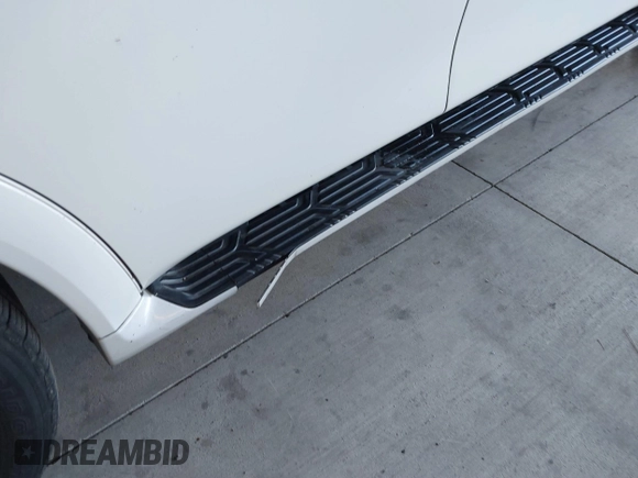2012 Infiniti QX56 8-passenger with VIN JN8AZ2ND0C9715396, listed as a IAAI auction lot 41267602 with 206,630 mi miles and . Bid and sale history available at DreamBid. Image 20.