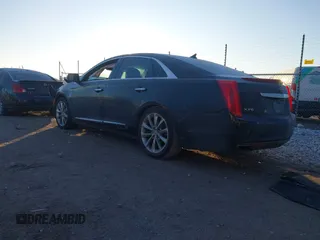 2014 Cadillac XTS Luxury with VIN 2G61M5S32E9289279, listed as a IAAI auction lot 41279495 with 106,655 mi miles. Bid and sale history available at carsss.com. Image 3.