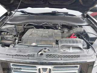 2007 Honda Ridgeline RTL w/Leather with VIN 2HJYK16547H514246, listed as a IAAI auction lot 41445289 with 189,874 mi miles. Bid and sale history available at carsss.com. Image 10.