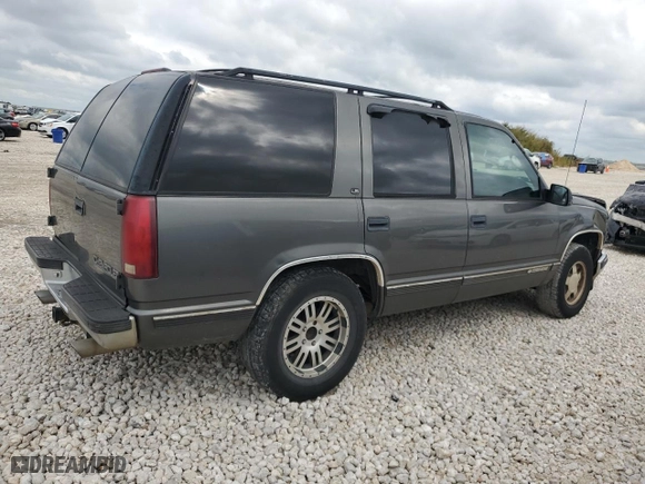 1999 Chevrolet Tahoe with VIN 1GNEC13R6XR150124, listed as a Copart auction lot 70630524 with 238,990 mi miles and Salvage Title. Bid and sale history available at carsss.com. Image 3.