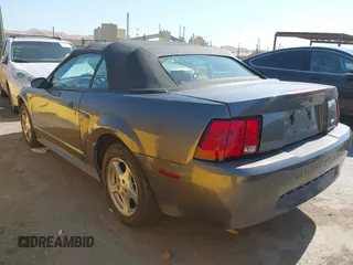 2003 Ford Mustang Deluxe z VIN 1FAFP44473F341011, wystawiony jako IAAI lot #42715064 z przebiegiem 177 458 mil mil oraz . Historia ofert i sprzedaży dostępna na DreamBid. Obrazek 3.