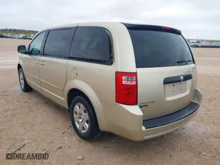 2010 Dodge Grand Caravan SE with VIN 2D4RN4DE4AR335133, listed as a IAAI auction lot 41966938 with 90,968 mi miles. Bid and sale history available at carsss.com. Image 3.