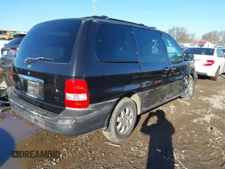 2004 Kia Sedona LX with VIN KNDUP131X46601278, listed as a IAAI auction lot 41472321 with 202,212 mi miles. Bid and sale history available at carsss.com. Image 4.