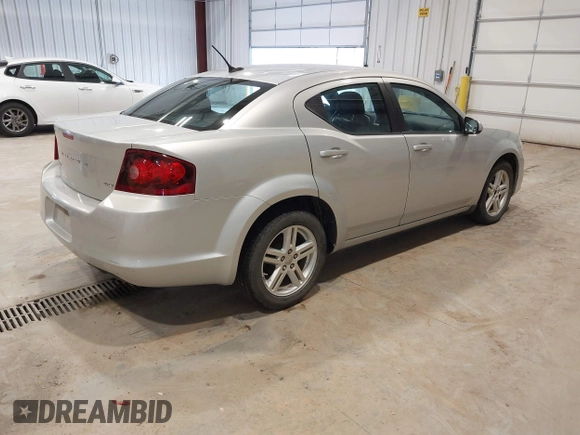 2012 Dodge Avenger SXT with VIN 1C3CDZCB5CN219812, listed as a IAAI auction lot 41928110 with 200,557 mi miles and . Bid and sale history available at carsss.com. Image 4.