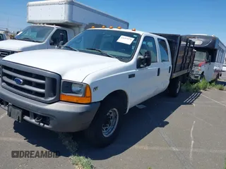 1999 Ford F-350 z VIN 1FDSW34S6XEE06653, wystawiony jako IAAI lot #42697070 z przebiegiem 194 164 mil mil oraz . Historia ofert i sprzedaży dostępna na DreamBid. Obrazek 2.
