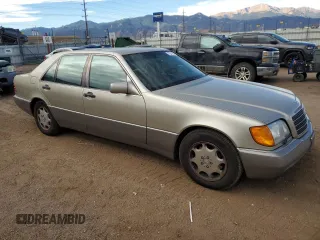 1994 Mercedes-Benz S with VIN WDBGA51E0RA172358, listed as a Copart auction lot 77541104 with 237,028 mi miles and Clean Title. Bid and sale history available at DreamBid. Image 4.