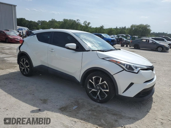 2019 Toyota C-HR XLE z VIN NMTKHMBX5KR079425, wystawiony jako Copart lot #57315345 z przebiegiem 109 441 mil mil oraz Szkoda całkowita • Salvage title. Historia ofert i sprzedaży dostępna na DreamBid. Obrazek 4.
