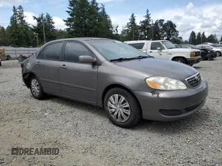 2005 Toyota Corolla CE with VIN 1NXBR32EX5Z407487, listed as a Copart auction lot 61650235 with 233,561 mi miles and Salvage title. Bid and sale history available at DreamBid. Image 4.