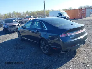 2014 Lincoln MKZ z VIN 3LN6L2J97ER835137, wystawiony jako IAAI lot #42062405 z przebiegiem 281 924 mil mil oraz . Historia ofert i sprzedaży dostępna na DreamBid. Obrazek 3.