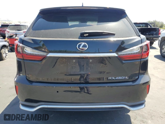 2018 Lexus RX 450hL Premium with VIN JTJDGKCAXJ2000538, listed as a Copart auction lot 61776195 with 74,988 mi miles and Salvage title. Bid and sale history available at DreamBid. Image 6.