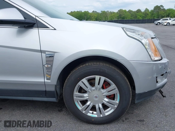 2011 Cadillac SRX Luxury Collection with VIN 3GYFNAEY5BS563048, listed as a IAAI auction lot 42031973 with 182,047 mi miles and . Bid and sale history available at DreamBid. Image 12.