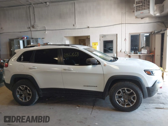 2020 Jeep Cherokee Trailhawk с VIN 1C4PJMBX5LD504439, выставлен на аукционе IAAI как лот 41867668 с пробегом 76 047 миль миль и . История ставок и продаж доступна на DreamBid. Изображение 13.