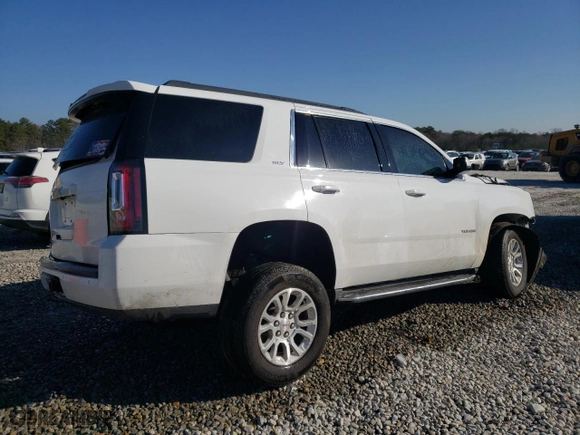 2019 GMC Yukon SLT with VIN 1GKS2BKC7KR170977, listed as a Copart auction lot 42416995 with 111,615 mi miles and Salvage Title. Bid and sale history available at carsss.com. Image 3.